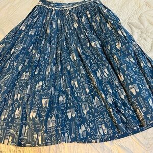 Vintage Alex Coleman wrap around skirt with rick rack and button placket. Cotton